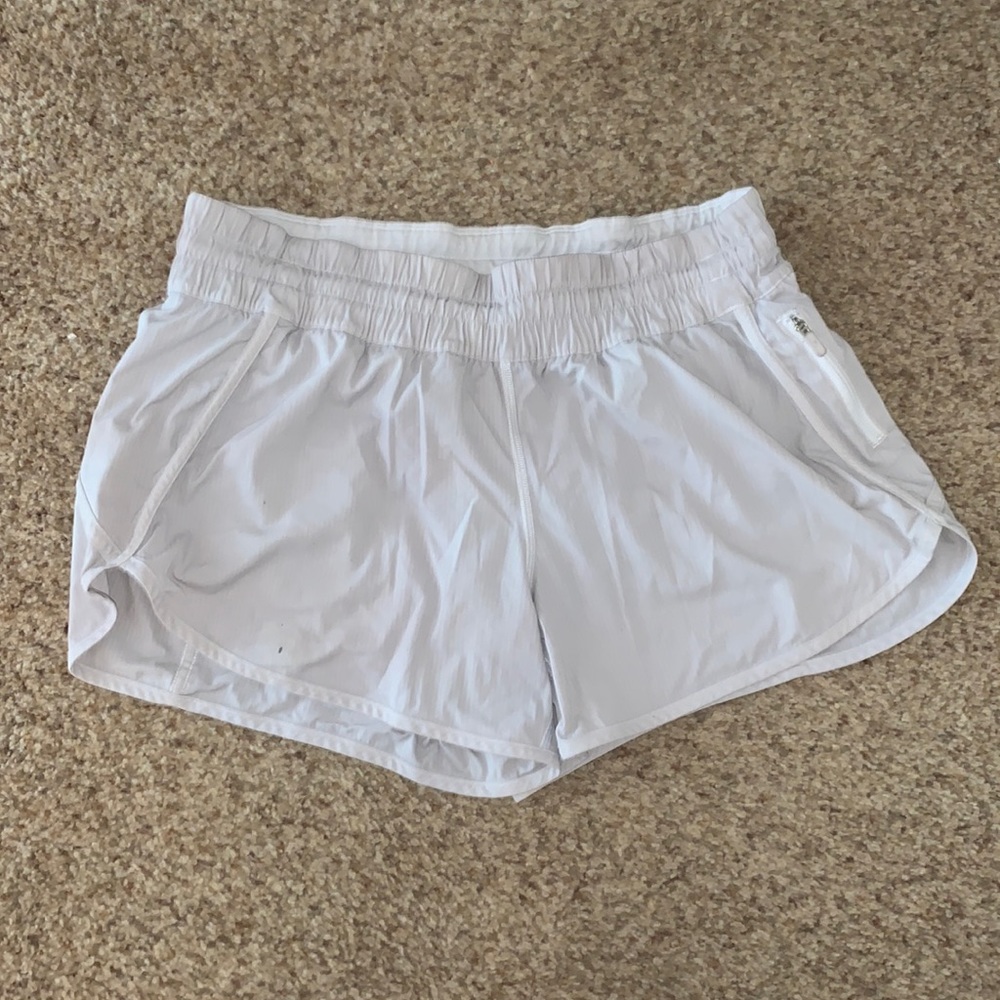 4” low rise tracker shorts, In good condition, slightly discolored, small stain